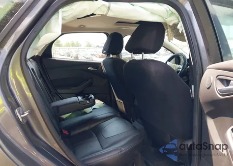 2012 Ford Focus Titanium z USA, uszkodzony, nr VIN 1FAHP3N26CL434121